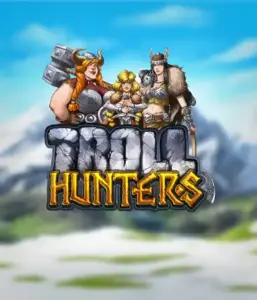 Изображение игрового автомата "Troll Hunters" от Play'N Go, на котором представлены три викинга: две женщины и один мужчина, одетые в традиционные викингские доспехи. За их спинами виднеются заснеженные горы, что создаёт атмосферу северных легенд. Этот слот идеален для поклонников викингских саг и поисков приключений.